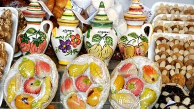 a bunch of vases with fruits and vegetables on them at 125 Oliveiras Terraces in Albufeira