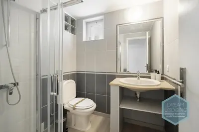 a bathroom with a toilet and a sink at Old Town - Albufeira - Dream Lodging in Albufeira