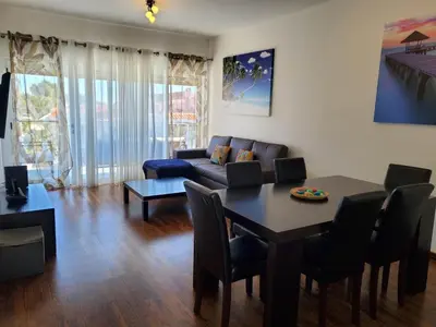 a living room with a table and a couch at 