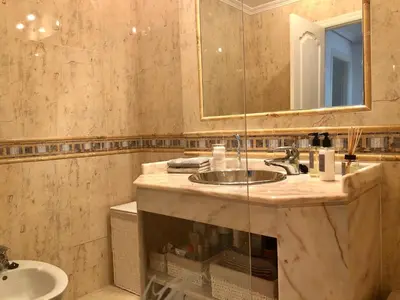 a bathroom with a sink and a mirror at Praia da Falésia - Falesia Beach - Apartment Pine Sun Park in Albufeira