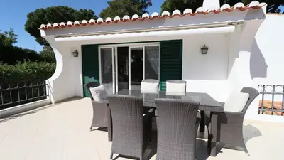 a bedroom with a bed with two towels on it at Beautiful Portuguese Villa Casa Das Buganvillas 3 Bedrooms Close To Praca in Vale do Lobo