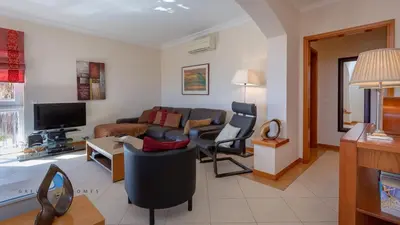 a living room with a couch and chairs at Greice Homes-Luxury 2 bed en-suite south facing & Golf view in Quarteira