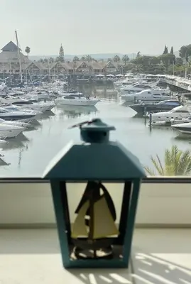 a street light in front of a marina with boats at Sunset Marina - Sea view - Vilamoura in Vilamoura