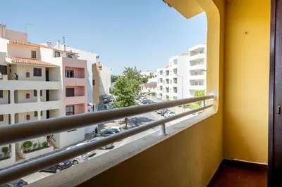 a balcony with a view of a parking lot at Bellavista Avenida By BeGuest in Albufeira