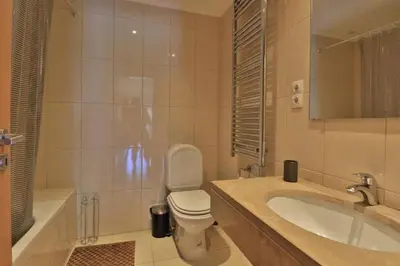 a bathroom with a toilet and a sink and a tub at Charming Vale Do Lobo Villa Casa Vale Do Lobo 832A 3 Bedrooms in Vale do Lobo
