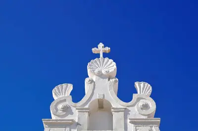 a cross on the top of a church steeple at Villa Quadradinhos 38Q 4 Bedrooms Private Pool Short Walk To The Beach in Vale do Lobo