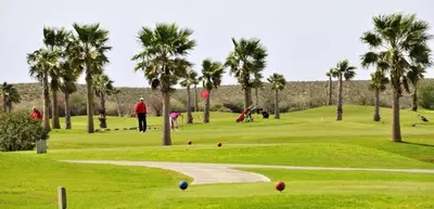 a group of people playing golf on a golf course at Villa Vale Do Lobo 626 3 Bedrooms Private Pool Short Walk To The Praca in Vale do Lobo