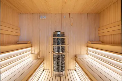 a sauna with a stack of wine bottles in it at 3HB Faro in Faro