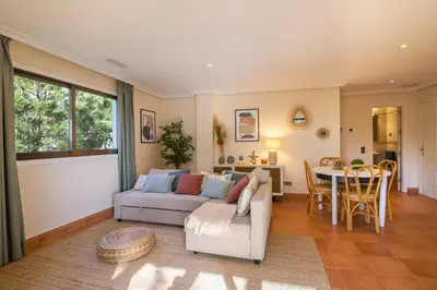 a bedroom with a bed and a window at Falésia Pine Spot in Albufeira
