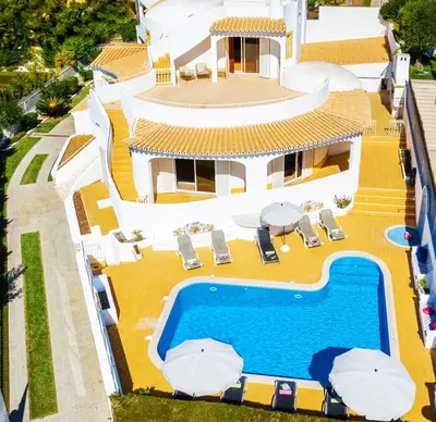an aerial view of a villa with a swimming pool at Villa Grace Bay by Algarve Vacation in Guia