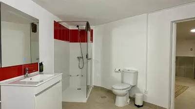 a bathroom with a toilet and a sink and a shower at Abby by Check-in Portugal in Albufeira