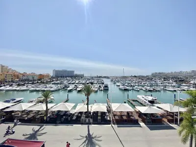 a marina filled with lots of boats in a harbor at Mira Marina - Vilamoura in Vilamoura
