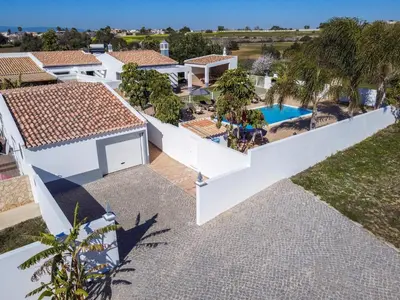 an aerial view of a villa with a swimming pool at Stunning Luxury Villa Private Pool, Galé Albufeira in Albufeira