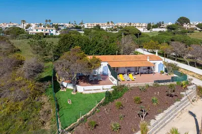 an aerial view of a house with a yard at Casa Mimao in Albufeira