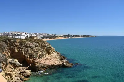 a view of the ocean from a cliff at Apartamentos Encosta do Mar in Albufeira