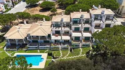 an aerial view of a large house with a swimming pool at Villa Moises in Albufeira