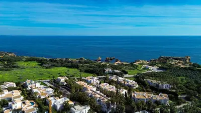 an aerial view of a resort near the ocean at Coastal Retreat with Pool and Beach Access by Drago Rentals in Albufeira