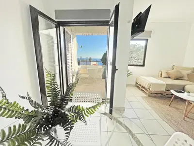 a view from the living room into the living room at Beachfront Oura - 100m Beach, Seaview, Garage, 300m Strip in Albufeira