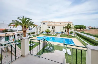 a view of the pool from the balcony of a house at Atlantico Sul in Quarteira