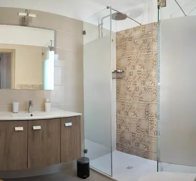 a bathroom with a shower and a sink at 6 Bedroom Private Villa Tenazinha I, with private pool in Albufeira