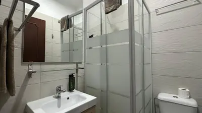 a bathroom with a sink and a glass shower at Lili by Check-in Portugal in Sesmarias