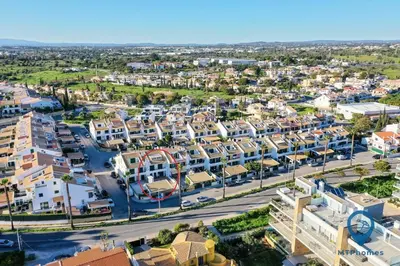an aerial view of a city with buildings at Vila Nico by MTPhomes in Albufeira