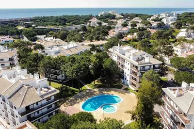 an aerial view of a apartment complex with a swimming pool at Falésia Park - Dream Lodging in Albufeira