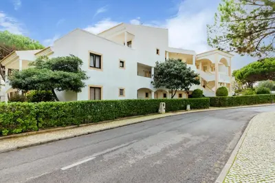 a swimming pool in front of a building at Steps Algarve ☀ @ Praia da Falésia 300 meters in Albufeira