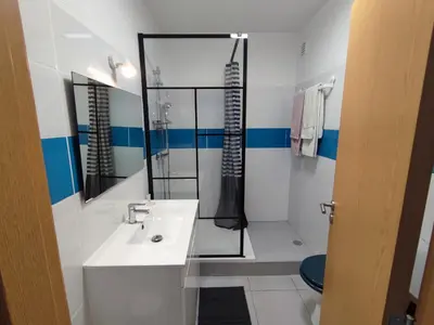 a bathroom with a sink and a shower at Alsol C 5361-1 in Quarteira