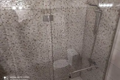a bathroom with a white sink in a room at Fabulous Sea view Studio near old town Albufeira in Albufeira