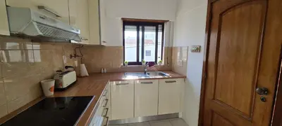 a small kitchen with a sink and a window at 1 bedroomed Apartment - Ocean View - Oura - Beach in Albufeira