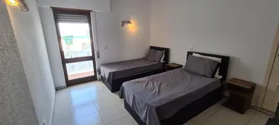 a small room with two beds and a window at 402 - Oura - 2 Bedroomed Apartment - Sea View in Albufeira