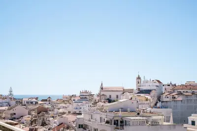 a view of a city with white buildings at Histórical City Center Penthouse Albufeira in Albufeira