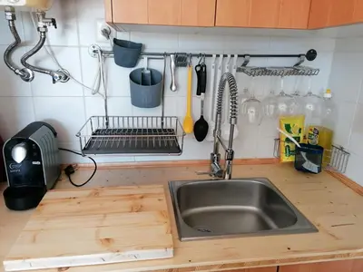 a kitchen counter with a sink and a sink at Old Village Vilamoura in Quarteira