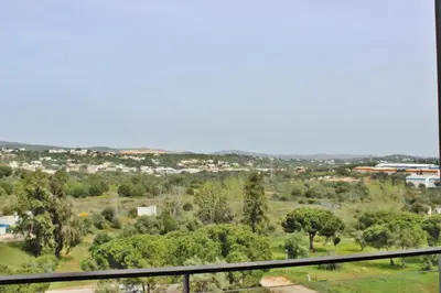 a view of a city from the balcony of a house at Residences Golf Club Apartment in Quarteira