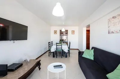 a living room with a couch and a table at #012 Exclusivo para Famílias, Habijovem by Home Holidays in Albufeira
