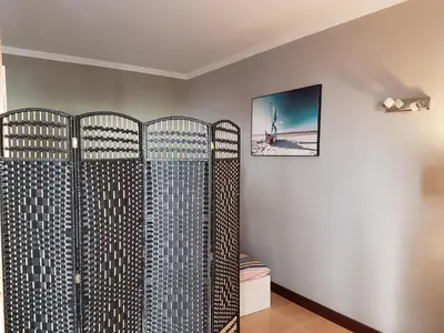 a room with a metal gate in a room at Aparto Golf in Guia
