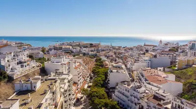 an aerial view of a city with the ocean at ALBUFEIRA (OLD TOWN) VERASOL AA - THE LUXURY STAY in Albufeira