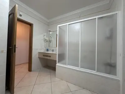 a bathroom with a shower and a sink at BayView Albufeira in Albufeira