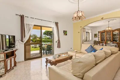 a living room with a couch and a table at Villa Barreto by Villa Plus in Pêra