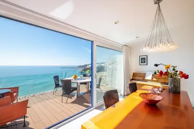 a bedroom with a bed and a painting on the wall at #041 Future House by Home Holidays in Albufeira