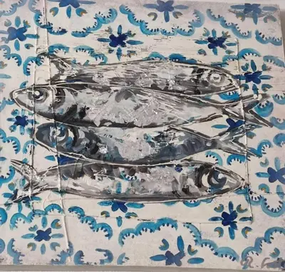 two glass birds sitting on top of a table at Charming Apartment in Vilamoura with Shared Pool - 70 m² in Vilamoura