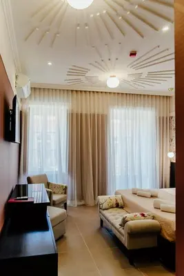 a living room with a couch and a table at Happy House Comfort Plus in Faro