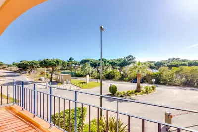 a balcony with a view of a street at AL - Apartamento Vila Sol F5 D in Vilamoura