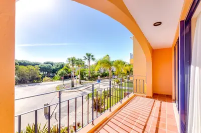 a balcony with a view of a street at AL - Apartamento Vila Sol F5 D in Vilamoura