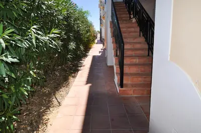 a shadow of a staircase on the side of a house at Oura Sea View by OCvillas in Albufeira