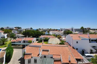an aerial view of a city with houses at Oura Sea View by OCvillas in Albufeira