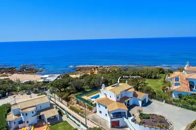 an aerial view of a house and the ocean at Villa Gregorio by Villa Plus in Galé