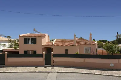 a house with a gate in front of it at Villa Siroco by Villa Plus in Albufeira