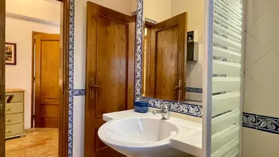 a bathroom with a sink and a mirror at Sol by Check-in Portugal in Vilamoura